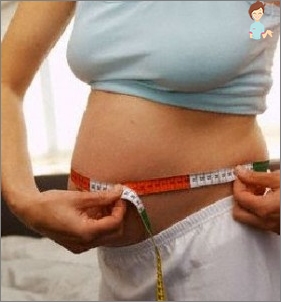 Stock Foto Belly Femei în timpul sarcinii 10 săptămâni